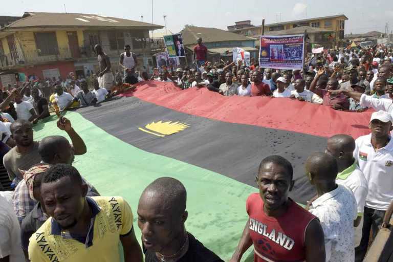 Large Biafra crowd with flag